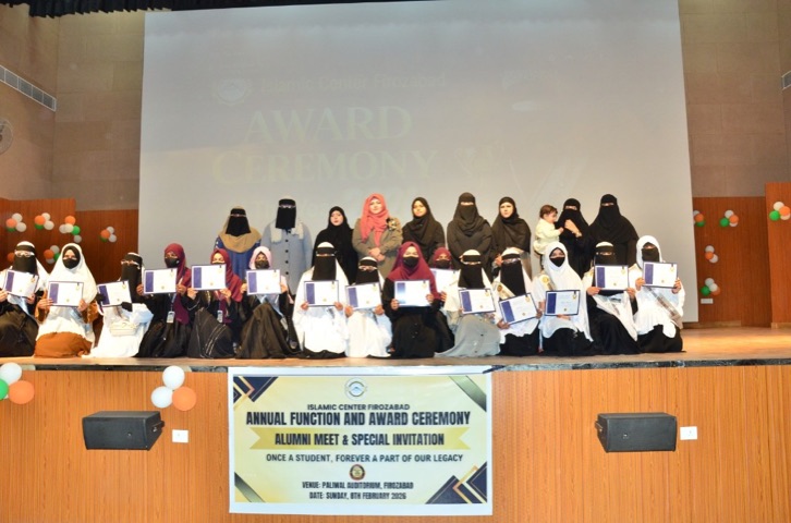 Female graduates holding certificates at the Annual Function and Award Ceremony, Paliwal Auditorium