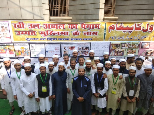 Students with their Rabi-ul-Awwal “Sunnah ko zinda karna” exhibition charts